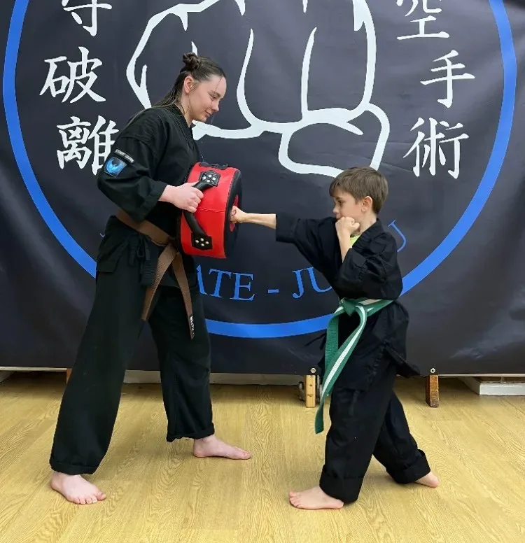 Students practising karate techniques at Shuhari Self Defence in Slough