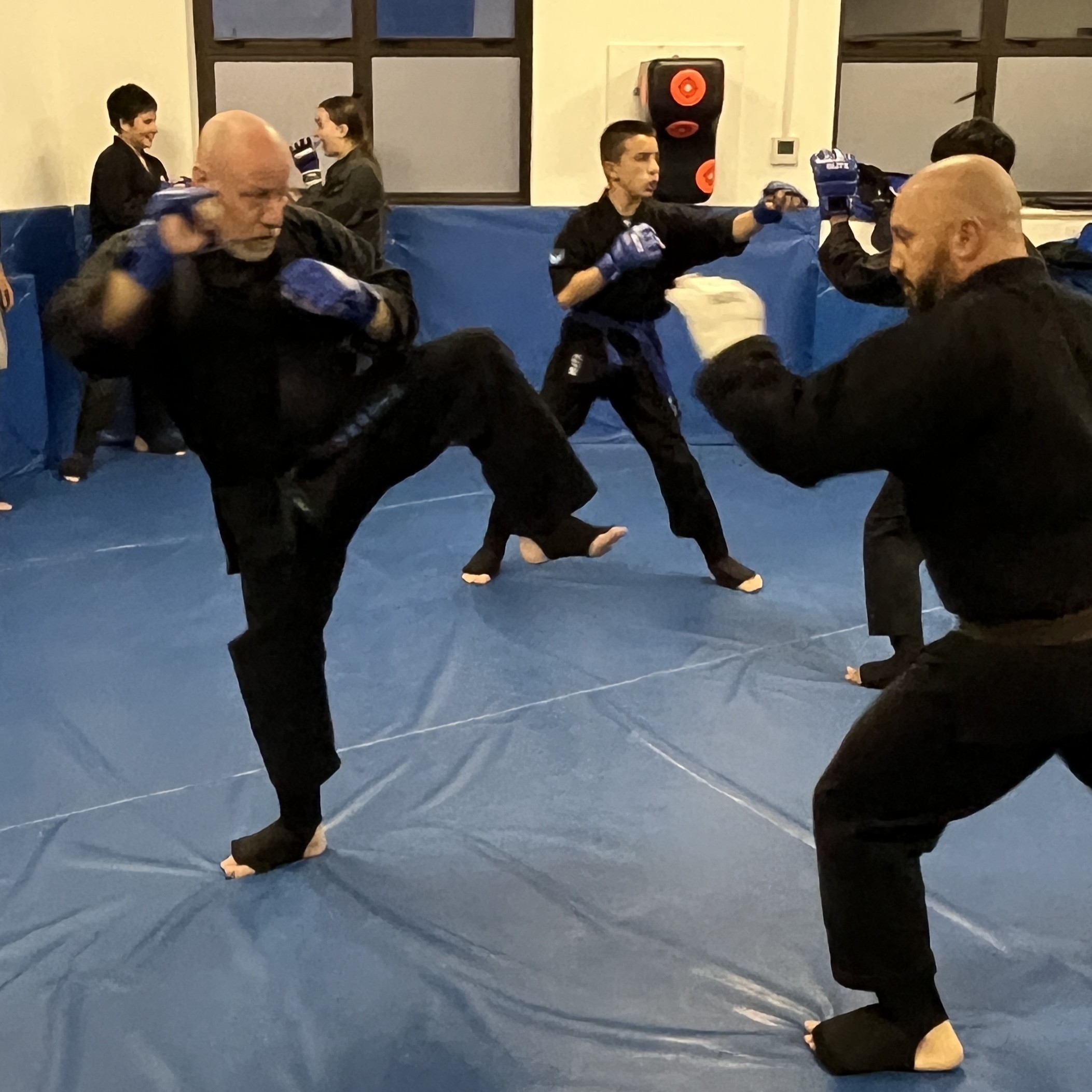 Brian Southon of Shuhari Self Defence Cippenham sparring with his instructor Olgun Tiltay Brian Southon of Shuhari Self Defence Cippenham sparring with his instructor Olgun Tiltay