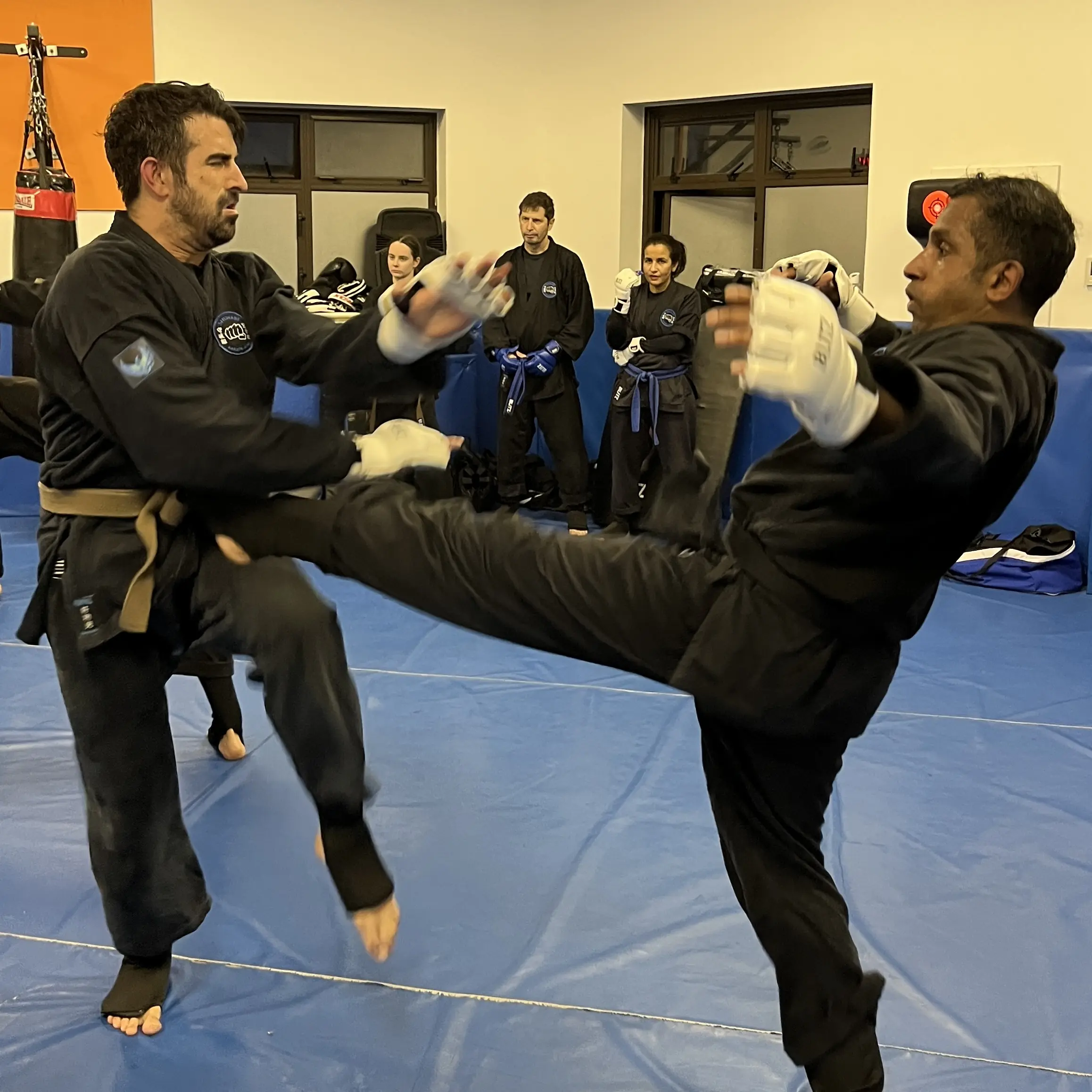 John Moses of Shuhari Self Defence Bracknell doing full contact sparring in an MMA class