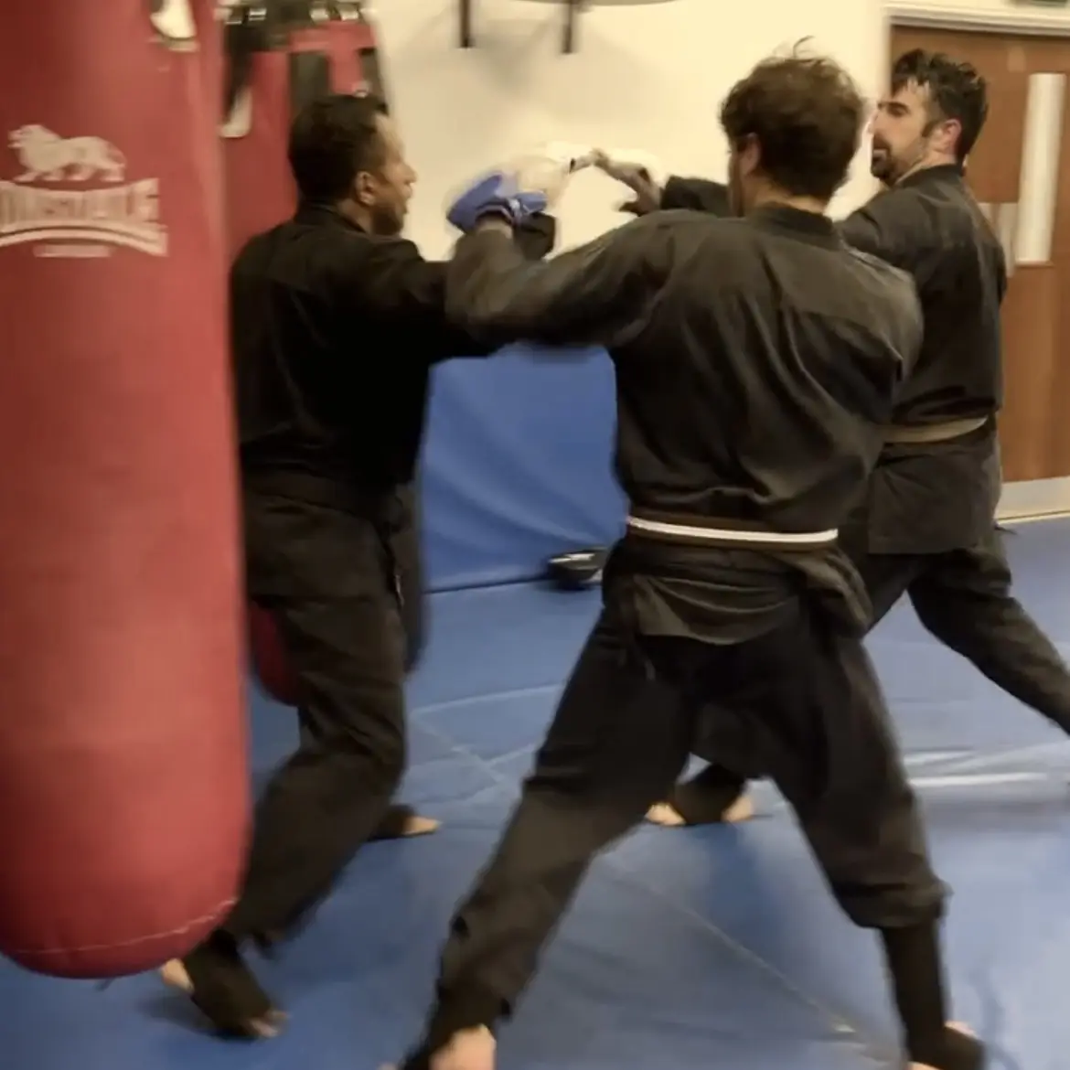 John Moses of Shuhari Self Defence Bracknell practicing multiple opponents sparring in a martial arts class