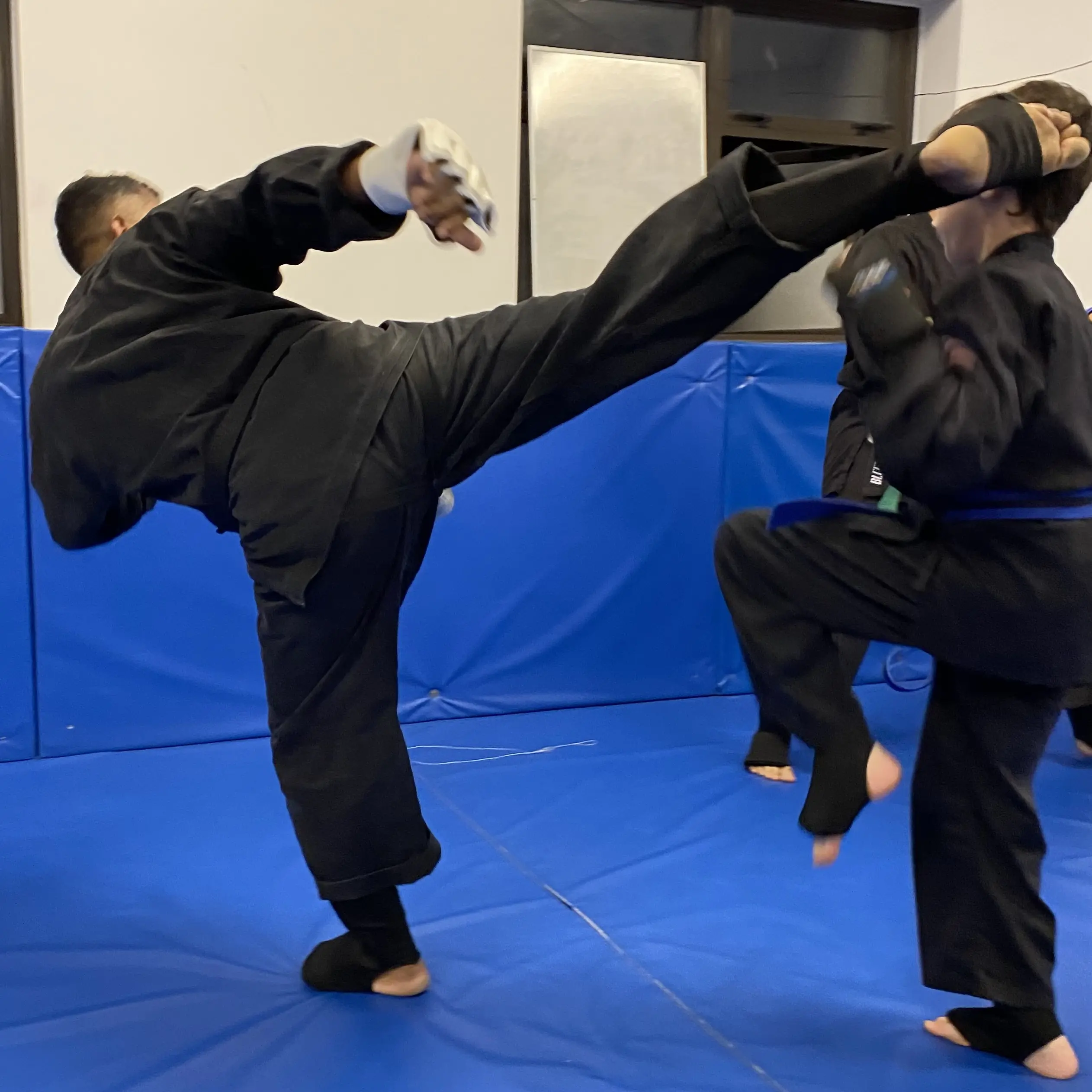 John Moses of Shuhari Self Defence Bracknell sparring in a karate class