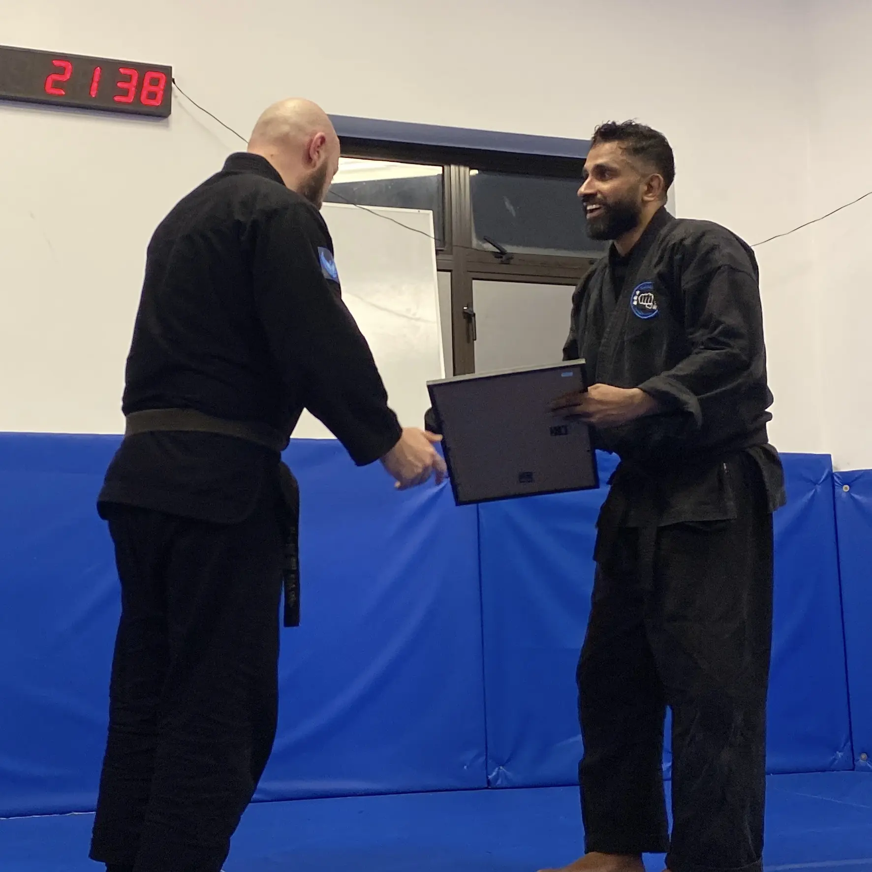 John Moses of Shuhari Self Defence Bracknell graded to his second dan black belt by his instructor Olgun Tiltay
