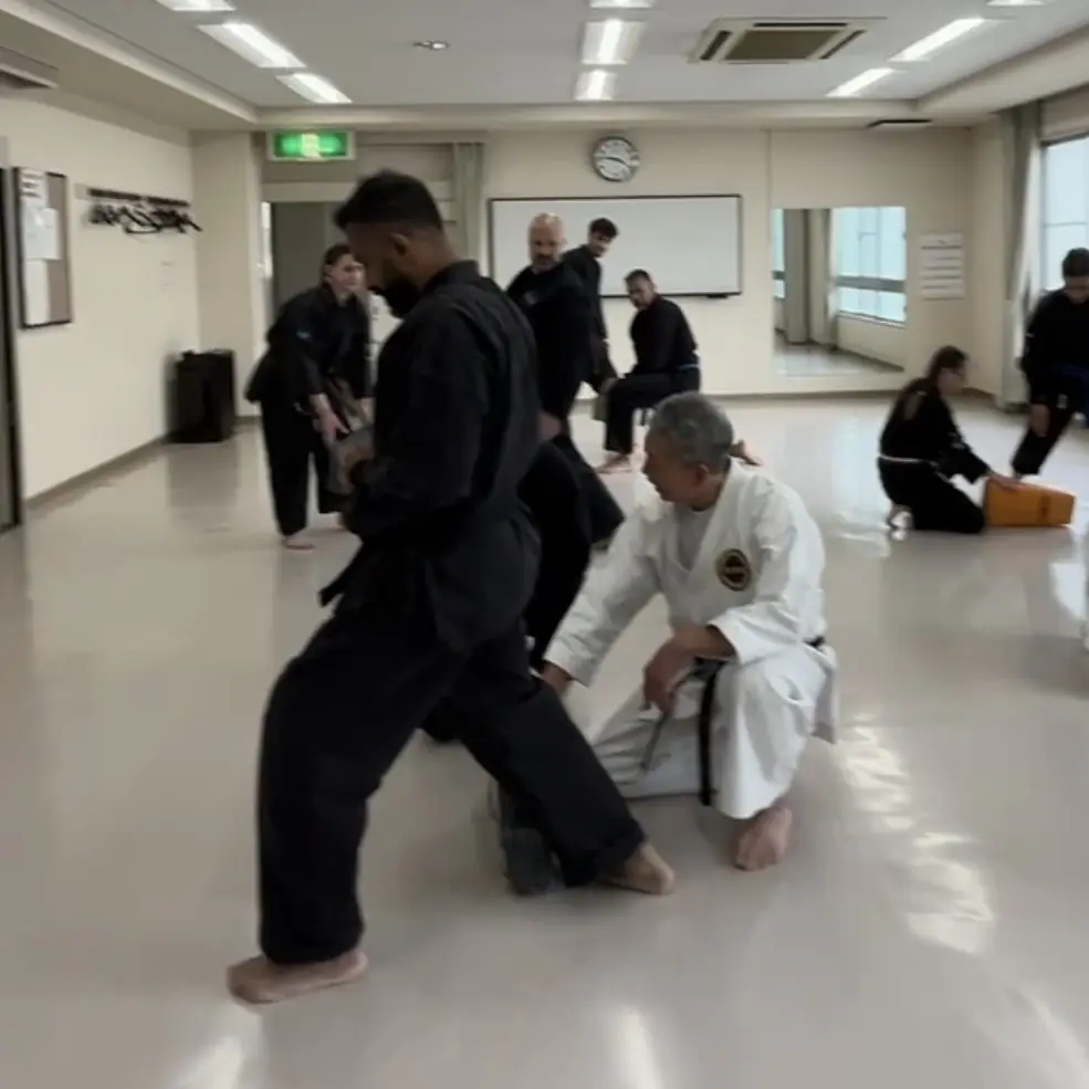 John Moses of Shuhari Self Defence Bracknell learning Karate & Kobudo in Nagoya Japan from Hideki Yamada Sensei [9th Dan Shorin-Ryu Karate]