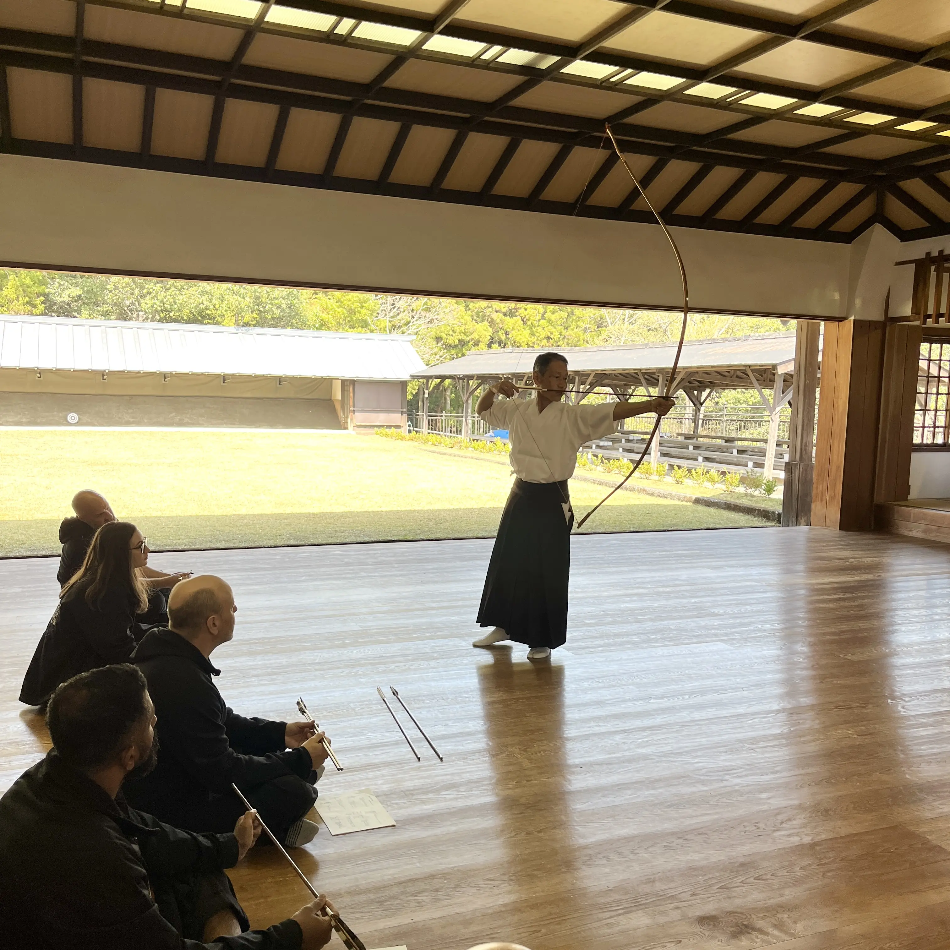 John Moses of Shuhari Self Defence Bracknell learning traditional Japanese archery in Mie Prefecture Japan from Urano Yuji Sensei [7th Dan Kyudo]