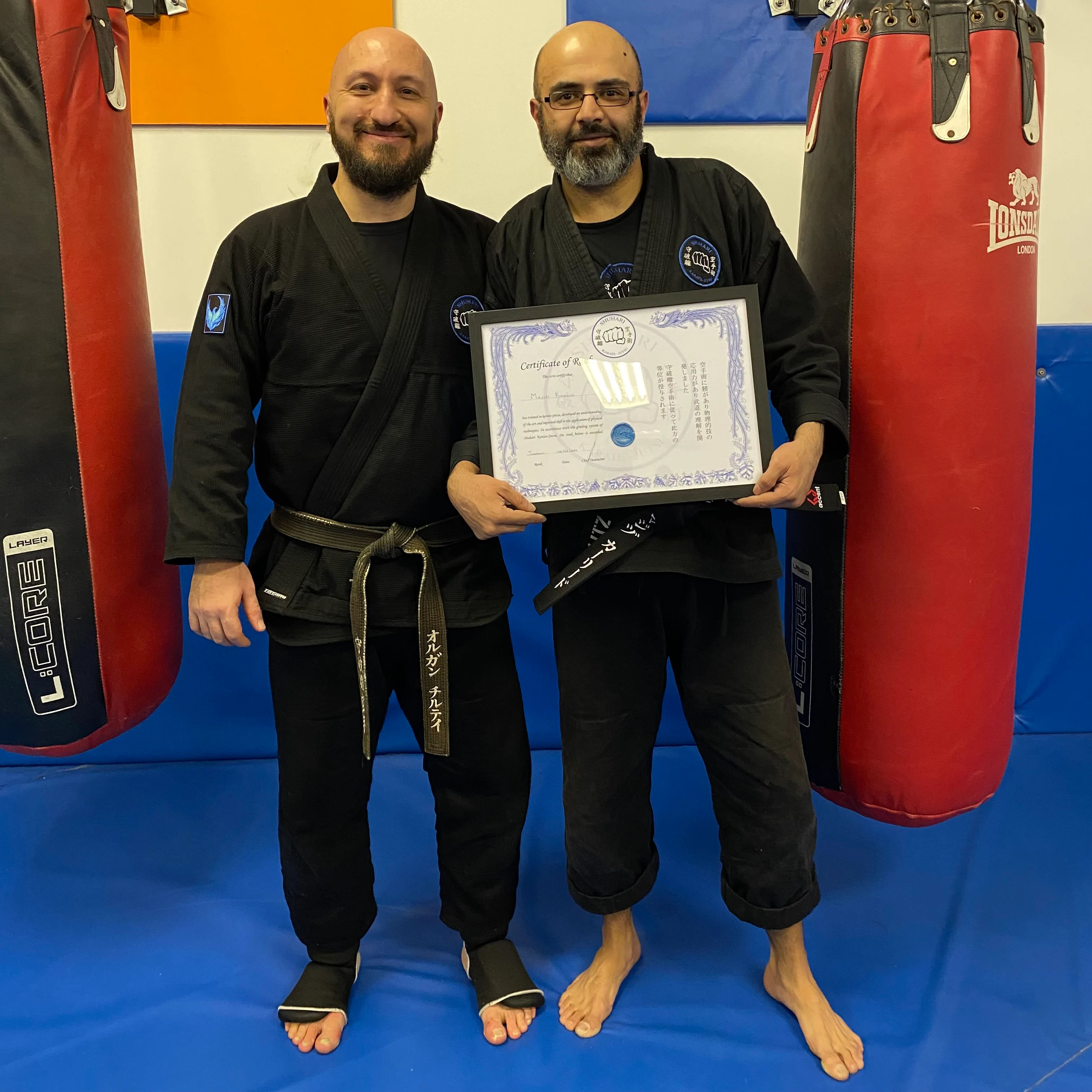 Majid Khalid of Shuhari Self Defence Slough graded to his first dan black belt in karate by his instructor Olgun Tiltay Majid Khalid of Shuhari Self Defence Slough graded to his first dan black belt in karate by his instructor Olgun Tiltay