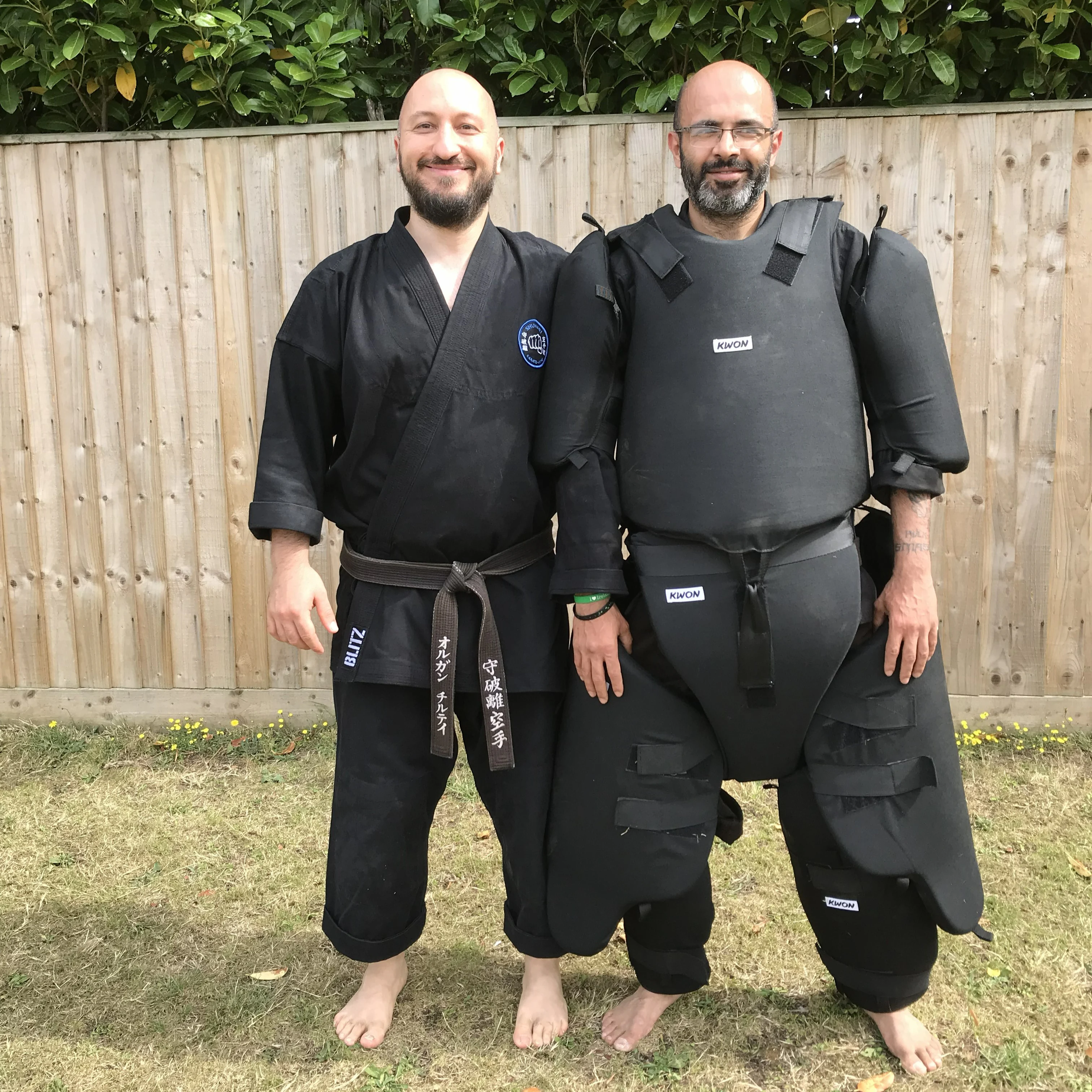 Majid Khalid of Shuhari Self Defence Slough testing the full contact suit with his instructor Olgun Tiltay in a martial arts seminar in Maidenhead Majid Khalid of Shuhari Self Defence Slough testing the full contact suit with his instructor Olgun Tiltay in a martial arts seminar in Maidenhead
