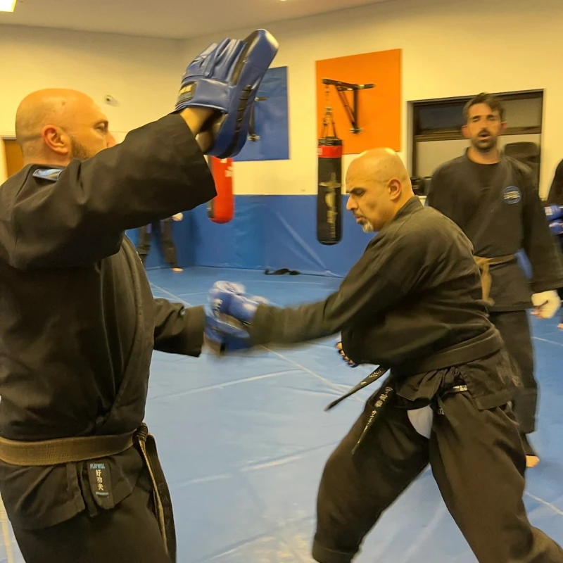 Majid Khalid of Shuhari Self Defence Slough practicing pad work in a martial arts session